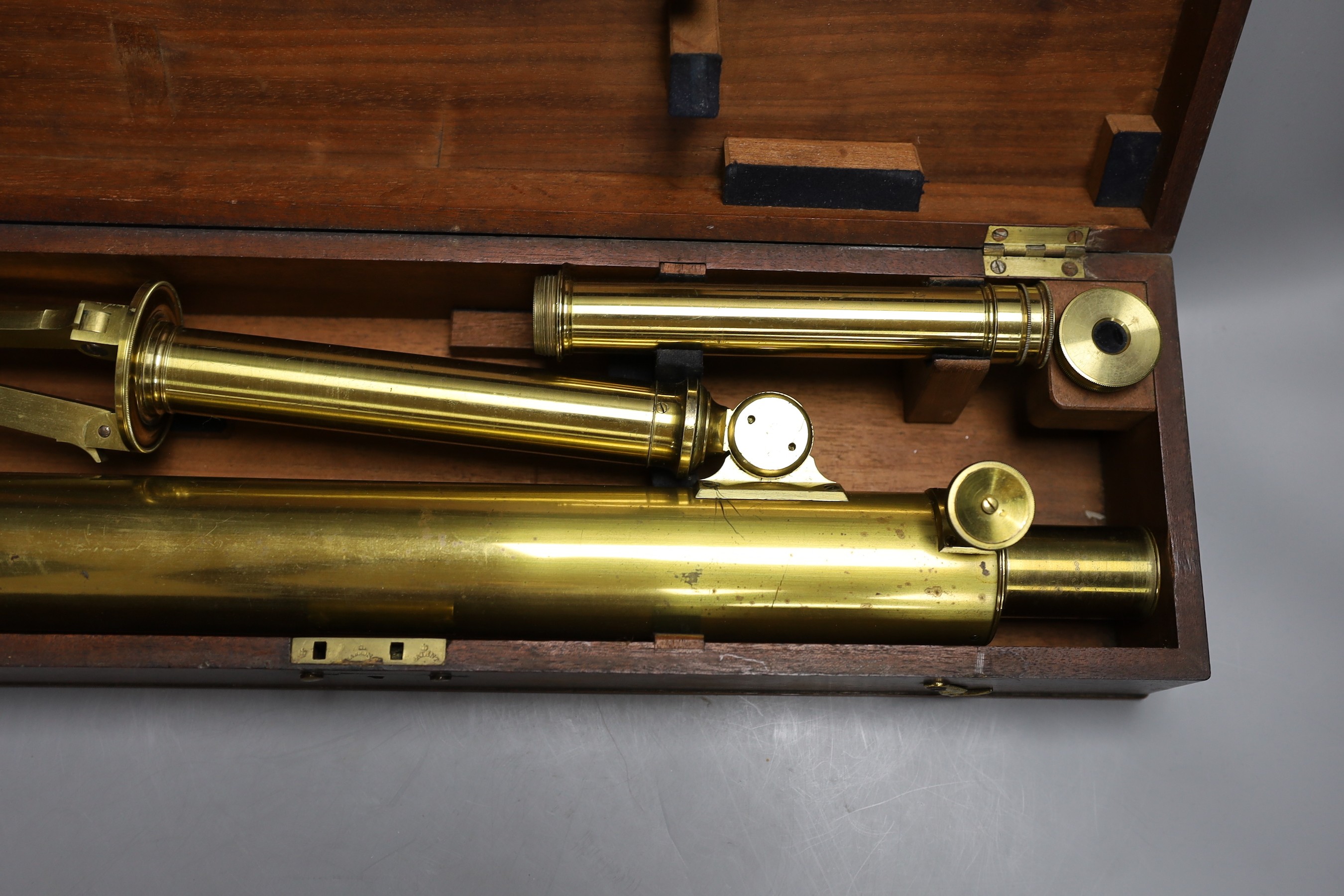 A cased set brass microscope